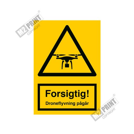 Advarselsskilt - Forsigtig! Droneflyvning pågår